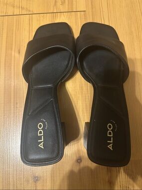 ALDO Black Square-Toe Slide Sandals with Gold Logo